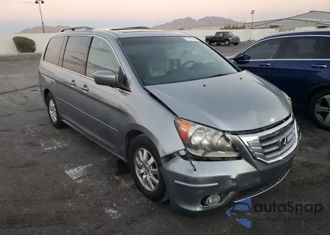 2010 Honda Odyssey Exl z USA, uszkodzony, nr VIN 5FNRL3H7XAB020762